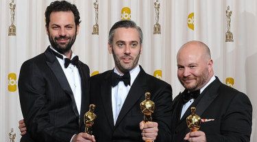 Producers Emile Sherman, Iain Canning and Gareth Unwin with their Academy Awards for The King’s Speech. 