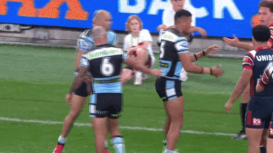 Marky Mark wins trash talk and try battle as Roosters rattle Sharks