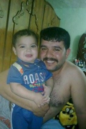 Ghanim al-Shnen with his son Ali in Iraq. 
