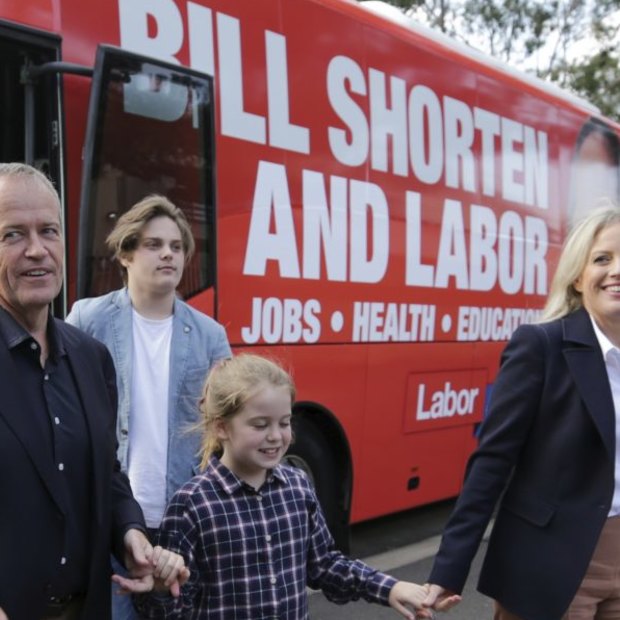 Bill and Chloe Shorten exit the campaign bus with their children Rupert and Clementine.