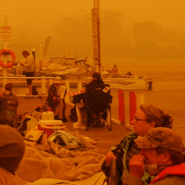 Residents and holidaymakers gathered on the pier to escape the Mallacoota inferno.