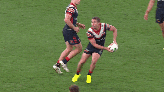 Latrell Mitchell crunches Toby Rodwell with a huge tackle.
