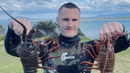 Cronulla’s Connor Tracey with his latest catch.