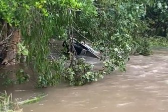 A woman has been found dead in a submerged car in central Queensland’s flooding at Mt Ossa near Mackay.
