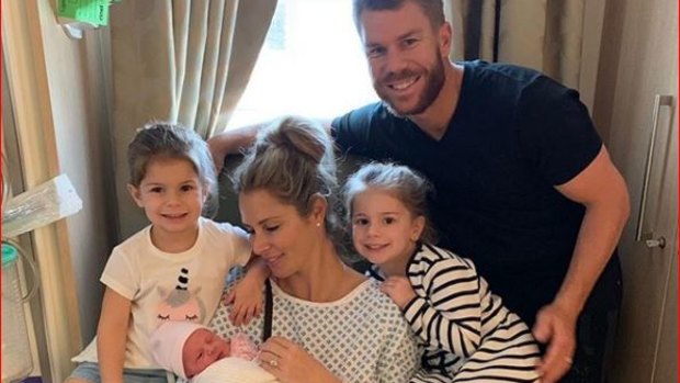 David and Candice Warner pose with their newest addition, daughter Isla Rose.