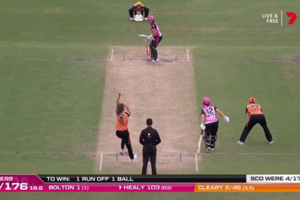 Alyssa Healy hits a four to win the match for the Sixers.