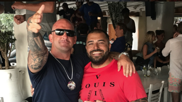 Ali Bazzi (right) with Comanchero boss Mark Buddle in the Mediterranean. Buddle allegedly tasked Bazzi with taking charge of the gang in Australia.