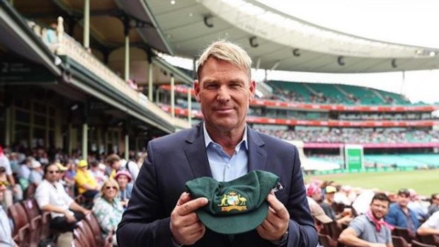 Shane Warne and his baggy green. 