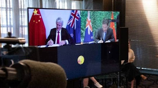 NZ Trade Minister Damien O’Connor and China’s Commerce Minister Wang Wentao sign an upgraded free-trade deal via video-link on Tuesday.