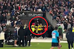 Projectiles are thrown at the referees at Eden Park.
