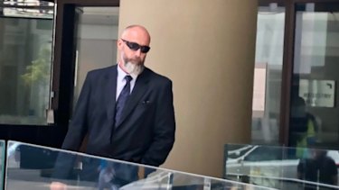 Adrian Trevor Moore leaves court.