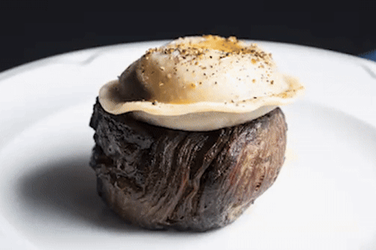 Bistecca al pepe - eye fillet steak topped with a pepper sauce-filled raviolo - at Gambino restaurant in Glen Waverley.