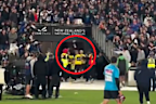 Projectiles are thrown at the referees at Eden Park.