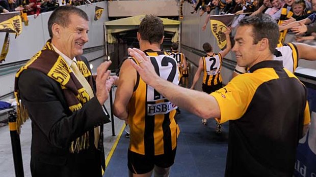 Jeff Kennett with Hawthorn coach Alastair Clarkson in a 2012 preliminary final against Adelaide.