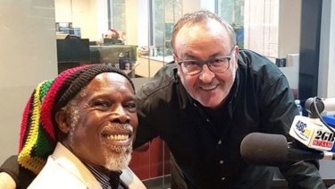 Happier times: 2GB host Chris Smith, right, recently had music legend Billy Ocean on his show.