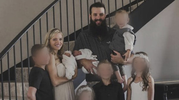 Family members identified one of the victims as Maria Rhonita, left, pictured with her husband and seven children.