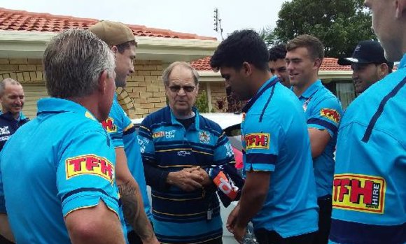Give 'em hell, boys! Tommy Raudonikis imparts some pearls of wisdom to the Titans before their bus trip to Brisbane.