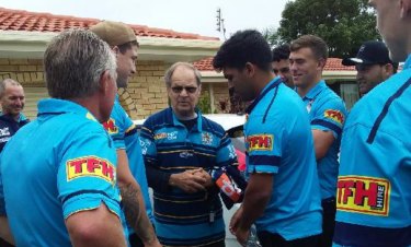 Give 'em hell, boys! Tommy Raudonikis imparts some pearls of wisdom to the Titans before their bus trip to Brisbane.