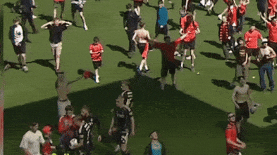 Soccer player bloodied after being struck in head by seat thrown by own fans