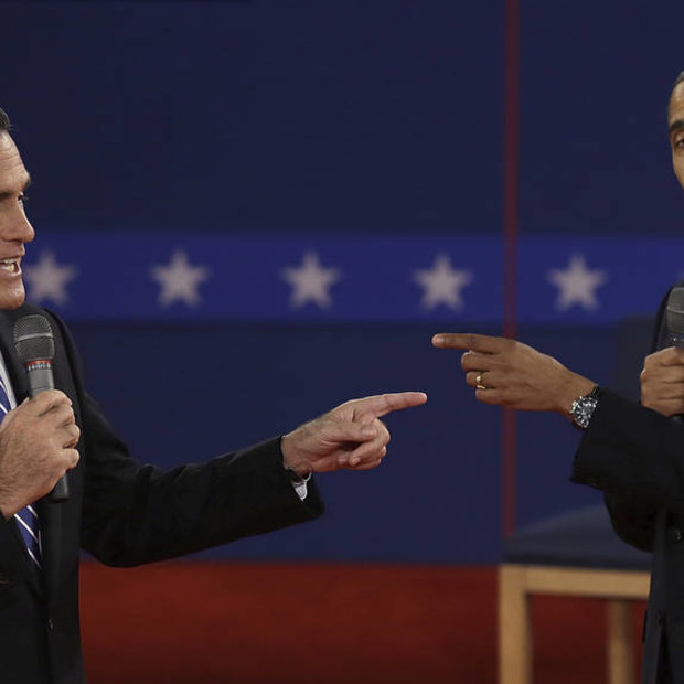 Mitt Romney and President Barack Obama spar during the second presidential debate in October 2012.