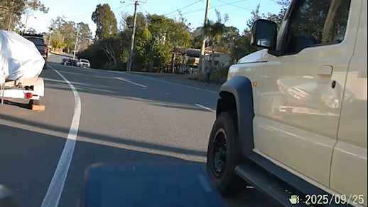 Michael Bradbrook recorded this close pass while cycling in Brisbane. Image is a still from a video.