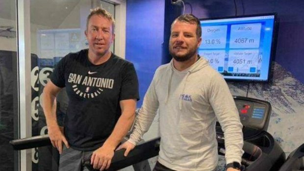 Roosters coach Trent Robinson (left) in the altitude room he has been using to acclimatise ahead of climbing Mount Kilimanjaro.