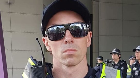Victoria Police is investigating this officer who wore an EAD Hippy sticker during the protests.