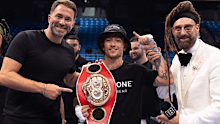 Liam Paro celebrates his world title win with Eddie Hearn. 