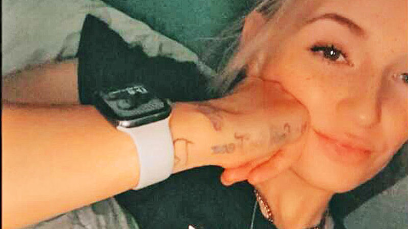 Arrest warrant for mother charged over house fire that killed two children