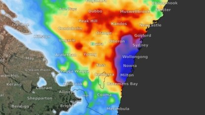 Sydney on high alert for flooding after three rescued amid heavy rain