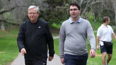 Prime Minister Kevin Rudd walks with adviser Patrick Gorman during an early morning walk in Adelaide.
