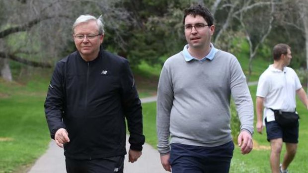 Prime Minister Kevin Rudd walks with adviser Patrick Gorman during an early morning walk in Adelaide.