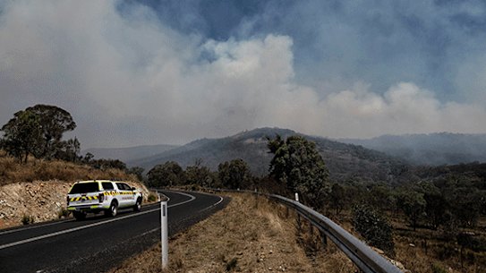 Sydney reaches hottest day in two years as almost 40 fires burn across NSW