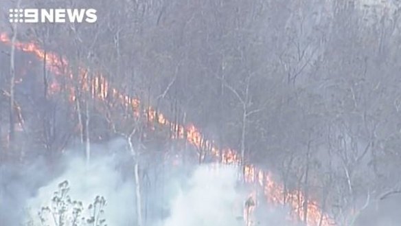 Fire has been crawling across the landscape around Pechey north of Toowoomba, over the weekend