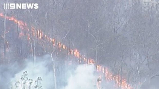 Fire has been crawling across the landscape around Pechey north of Toowoomba, over the weekend