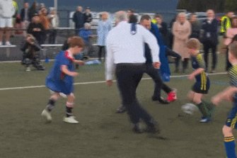 ‘Not quite up to the job’: Howard says Albanese is no Rudd; PM bowls over child playing soccer