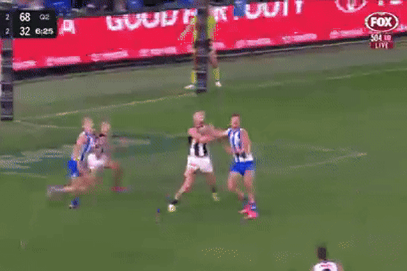 Bobby Hill takes a screamer in the second quarter of Sunday’s game against North Melbourne.