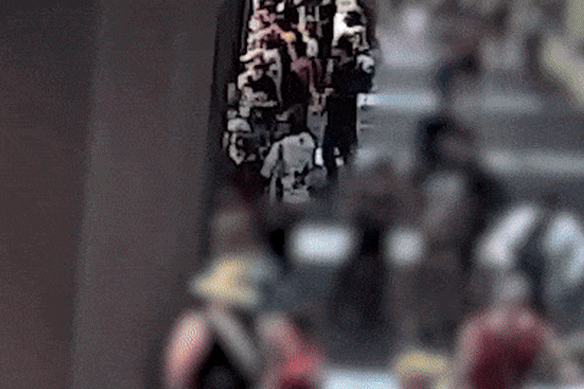 CCTV captured a man throwing the improvised explosive into the crowd. 