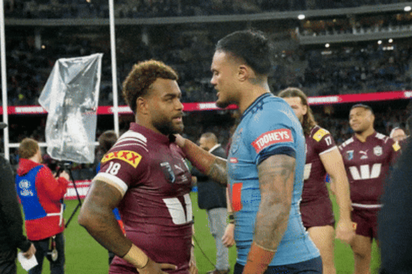 Ezra Mam and Spencer Leniu on the middle of Optus Stadium on Wednesday night.