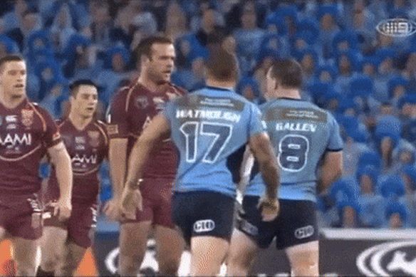 Paul Gallen punches Nate Myles.