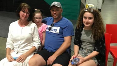 British tourists Fiona and Leon Senior and their daughters Lily and Grace were forced to evacuate the Opal Tower after an internal wall failed.