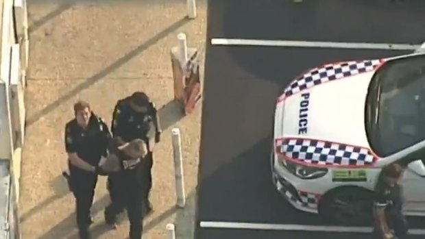 The accused gunman is arrested without further incident at a Gympie petrol station on Saturday. 
