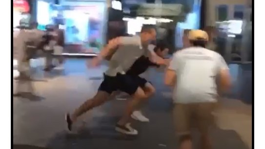 Tom Trbojevic in a foot race on Manly Corso.