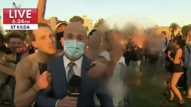 Seven News footage at St Kilda beach on Friday evening.