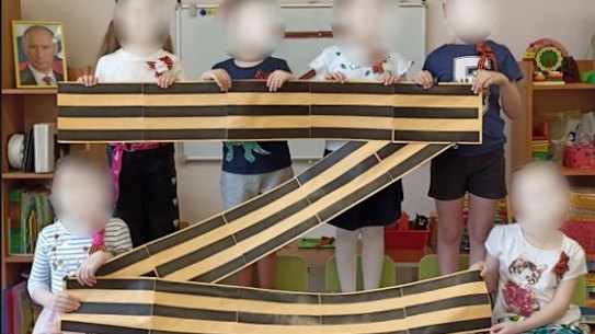 Across Russia, schools are uploading photos of children posing with Z signs to support the troops in Ukraine.  