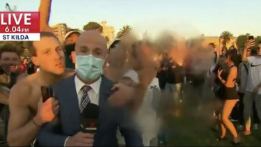 Seven News footage shows the scenes at St Kilda Beach on Friday evening.