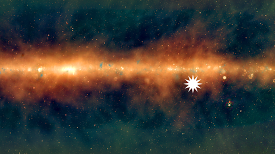 A view of the Milky Way from the Murchison Widefield Array, with the lowest frequencies in red, middle frequencies in green, and the highest frequencies in blue. The star icon shows the position of the mysterious repeating transient.