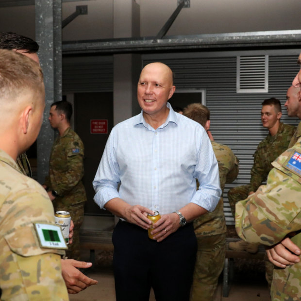 Peter Dutton met soldiers in Townsville last month.