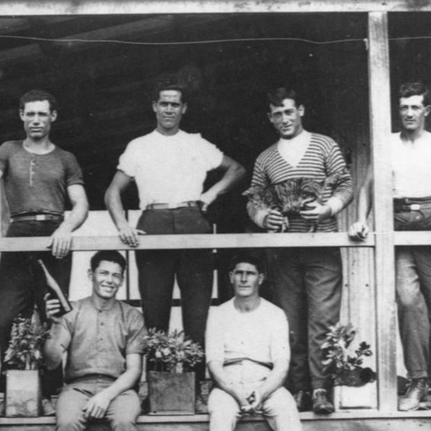 Costante Danesi (top left) poses with other Italian canecutters on a verandah. .
Back row: C. Danesi, P. D'Urso, G. Pappalardo, V. Barbagallo and A. Barbagallo. Front row: R. Spina, A. D'Urso, A. Sapunno and G Palazzolo.

