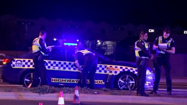 Police at the scene of a pedestrian death in Reservoir on Saturday night.